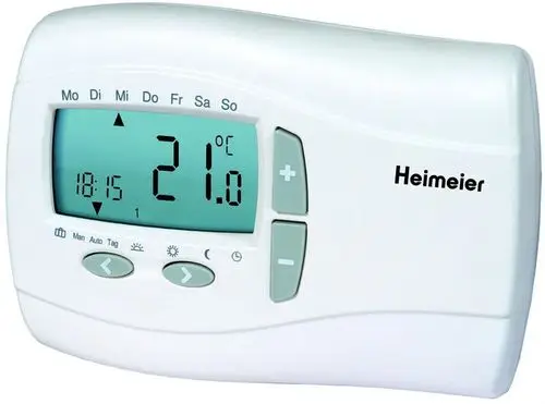 Digitaler Raumregler mit Display zur Heizungssteuerung, inklusive Temperaturanzeige und Tasten zur Einstellung. Hersteller: IMI Hydronic Engineering.